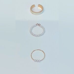 Elegant Pearl and Gold Ring Set